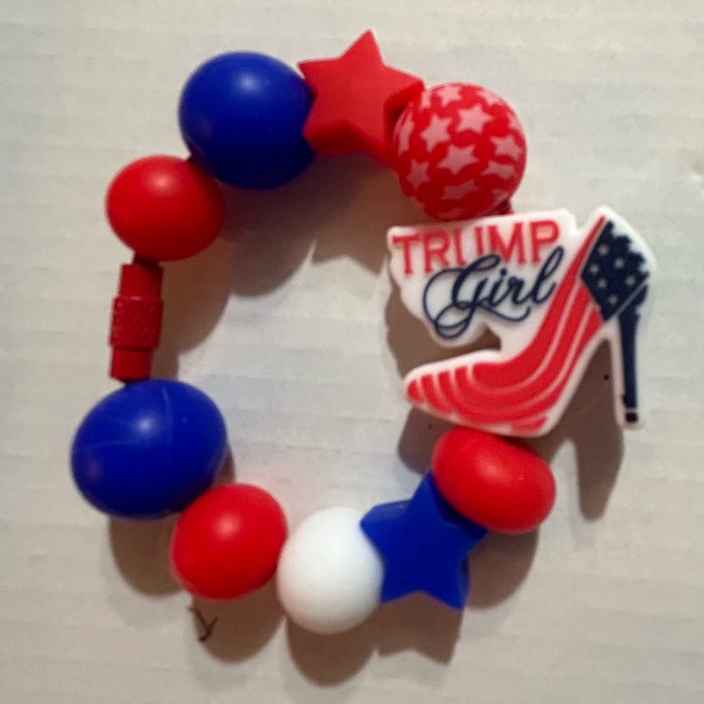 “Trump Girl” charm.